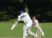 Wadebridge openeing batsman Tom Gurney is bowled out by Troon's Shane Richards.