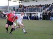 Saltash's Glen Palmer battles with Truro's Ian Gosling.