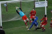 Saltash Dave Smith scoring their first goal past keeper Mark Gears. James Cudmore is on the line.