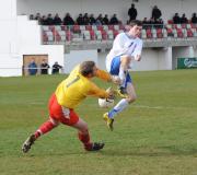 Veteran Wadebridge keeper Mark Gears saves from Camelford's Alex Ahearn.