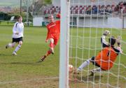 Wadebridge's Andy Harris scores past Penzance keeper Damien Normal