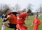 Wadebridge's Andy Harris battles with Penzance keeper Damien Normal